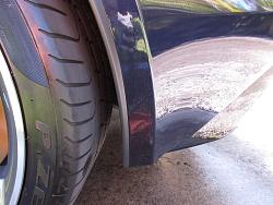 Rock chips galore-driver-side-behind-rear-wheel.jpg