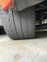 Right tire worn out while left looks new-left.jpg