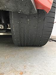 Right tire worn out while left looks new-right.jpg