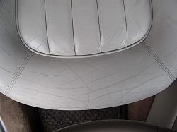The culprit is the factory finish-09-base-front-original.jpg