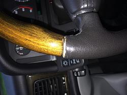 Closing gap between leather and wood on steering wheel-wheel2.jpg