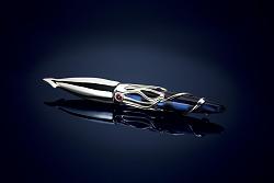 Look out, WaterDragon has gone crazy porting the intake elbow!  Photos inside.-squidpensilverruby.jpg