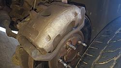 Replace both front hubs and discs-front-caliper-01.jpg