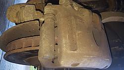 Replace both front hubs and discs-front-caliper-02.jpg