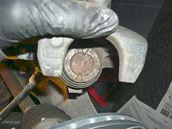 Low Dust Brakes-caliper-piston-before-retracting.jpg