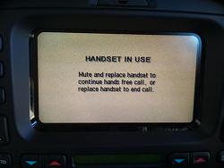 Can't find VOICE MODULE plug/harness in trunk!-whenpressphonebuttononconsole.jpg