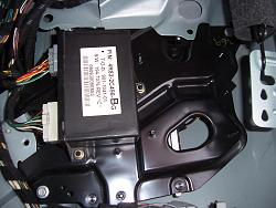 S Type fuel door latch-remove-electronics-unit.jpg