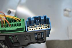 Empty plug under rear seats - anyone know what it is?-3.jpg