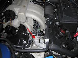 Changed spark plugs now leaking coolant!?!? PLEASE HELP!!-water-pipe-w-arrow.jpg