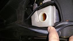 Blackish Fluid Leak near rear tire-jagbrakeresevor.jpg