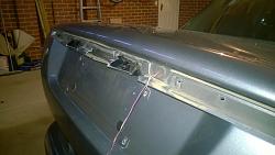 Rear Number Plate Lights Melted-number-plate-light-02.jpg