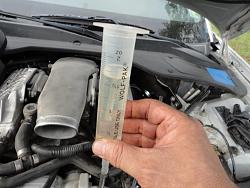 Changed the supercharger oil today-adding-new-oil.jpg