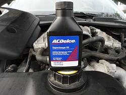 Changed the supercharger oil today-new-supercharger-oil.jpg