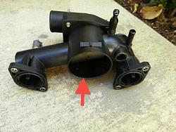 Coolant leak and overheating-thermostat-complete-housing-replacement-w-arrow.jpg