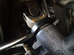 1999 XJ8, "play" in steering-steering-rack-connection-close-up.jpg