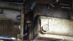 Can someone tell me what is this under my car?-20141019_155042.jpg