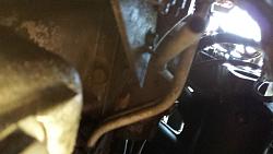 Can someone tell me what is this under my car?-20141019_155116.jpg