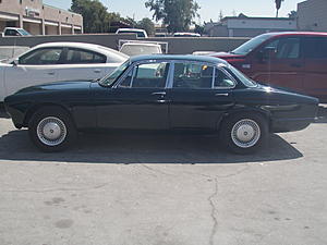 Spacesaver "donut" spare tire-side-view-paint-done.jpg
