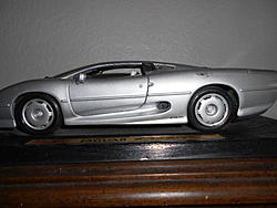 What other Jaguar would you buy to keep your current one &quot;company&quot;-xj220-trophy-001.jpg