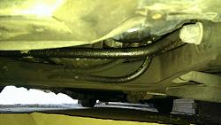 What's this stuff leaking from my 95 v12-leaking.jpg