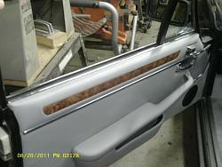 got the interior done on the Jag-1-daverb-139963-albums-xjs-interior-finally-done-10042-picture-door-trim-also-added-chrome-door-.jpg