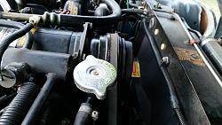 Coolant on the engine filler cap and A/C compressor-20140820_165150.jpg