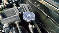 Coolant on the engine filler cap and A/C compressor-20140903_105654.jpg