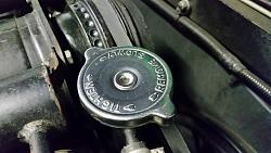 Coolant on the engine filler cap and A/C compressor-20140903_154858.jpg