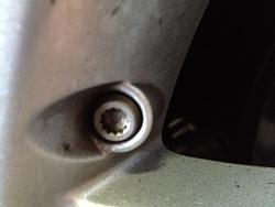 How Do I remove these fake Wheel Bolts?-nut.jpg