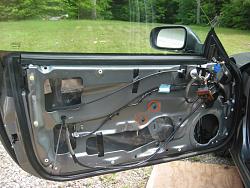 Drivers Window struggles initially to go down-xkr-inside-door.jpg