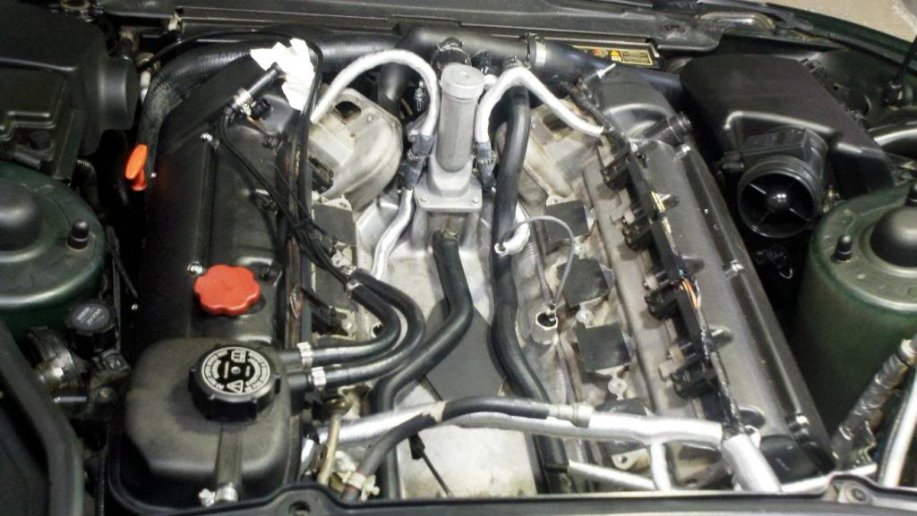 Name:  EngineIntakeManifoldandThrottleBodyRemovedaftercleaningandcooltubesinstallb3-12-2012_zp.jpg
Views: 1978
Size:  84.3 KB