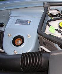 One More Small Improvement-xk8-2005-suspension-caps.jpg
