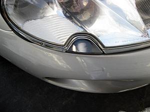 2000 XK8 Headlight assembly removal-washer-cover.jpg