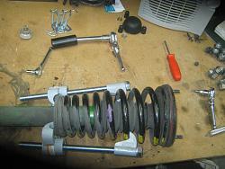 Changing front and rear shocks on 1997 XK8-jag-fr-spring-pad-03.jpg