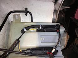 Windshield Washer Leaking, or Overfilled?-jag-washer-fluid-tank-leak.jpg