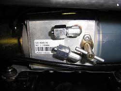 Convertible top: conversion to manual latch operation-metric-port-caps-installed.jpg