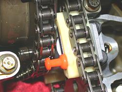 experience &amp; pics of replacing the upper cam chain tensioners(2-post with PICS)How To-left-bank-new-metal-tensioner-front-view.jpg