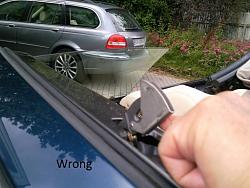 Convertible roof stuck open with gap between window and roof and rear windows down-stuck-latch-cover.jpg