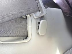 Mystery part below seat belt in rear side panel-image.jpg