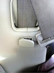 Mystery part below seat belt in rear side panel-belt.jpg