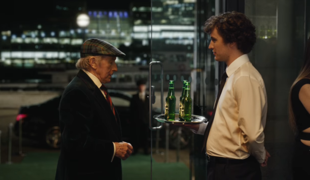Jaguar-Driving Jackie Stewart Promotes Beer by Not Drinking Any