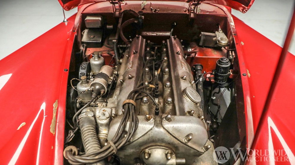 At Auction: Denise McCluggage's 1956 Jaguar XK140 MC DHC